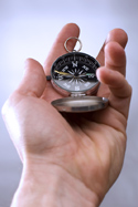 Hand with compass