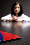 Lady sitting at table