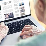 Older adult viewing webpage
