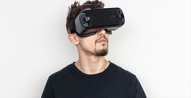 person using virtual reality glasses