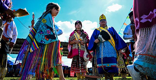 group of indigenous people in traditional dress