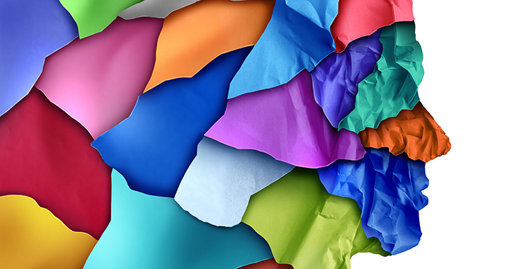 graphic of a head made of colored paper pieces