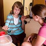 Autistic girl attending therapy.