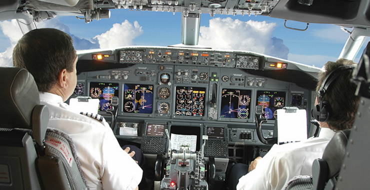 pilot and copilot in aircraft cockpit