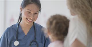 doctor working with child